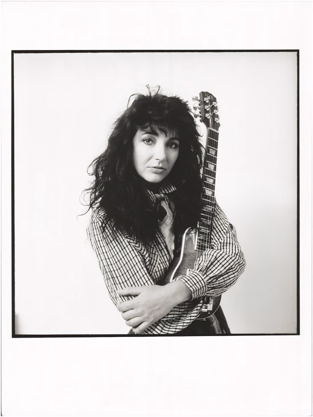 Holding A Guitar Photograph