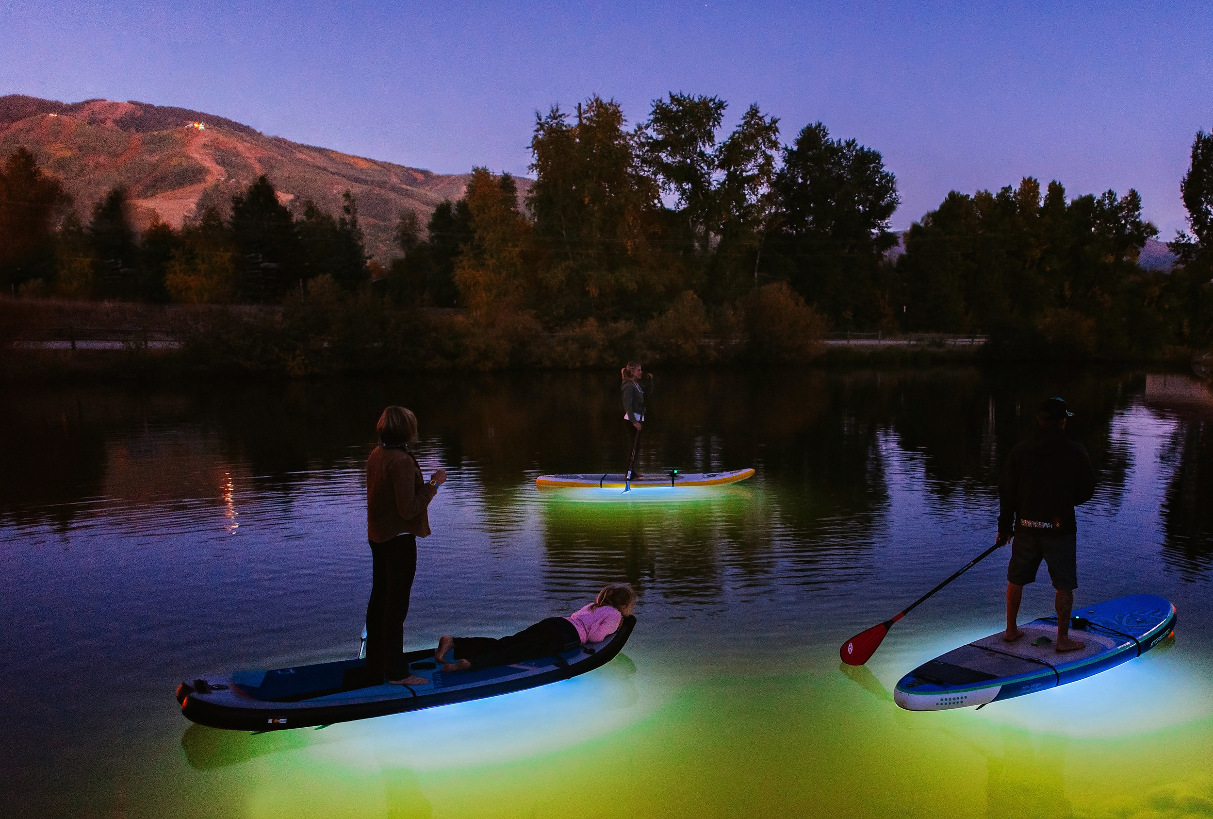 Paddleboards with Glow Lights on Fetchers Pond