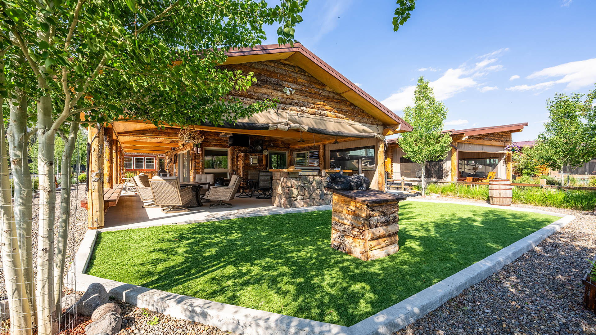 Outdoor kitchen pavilion and lawn