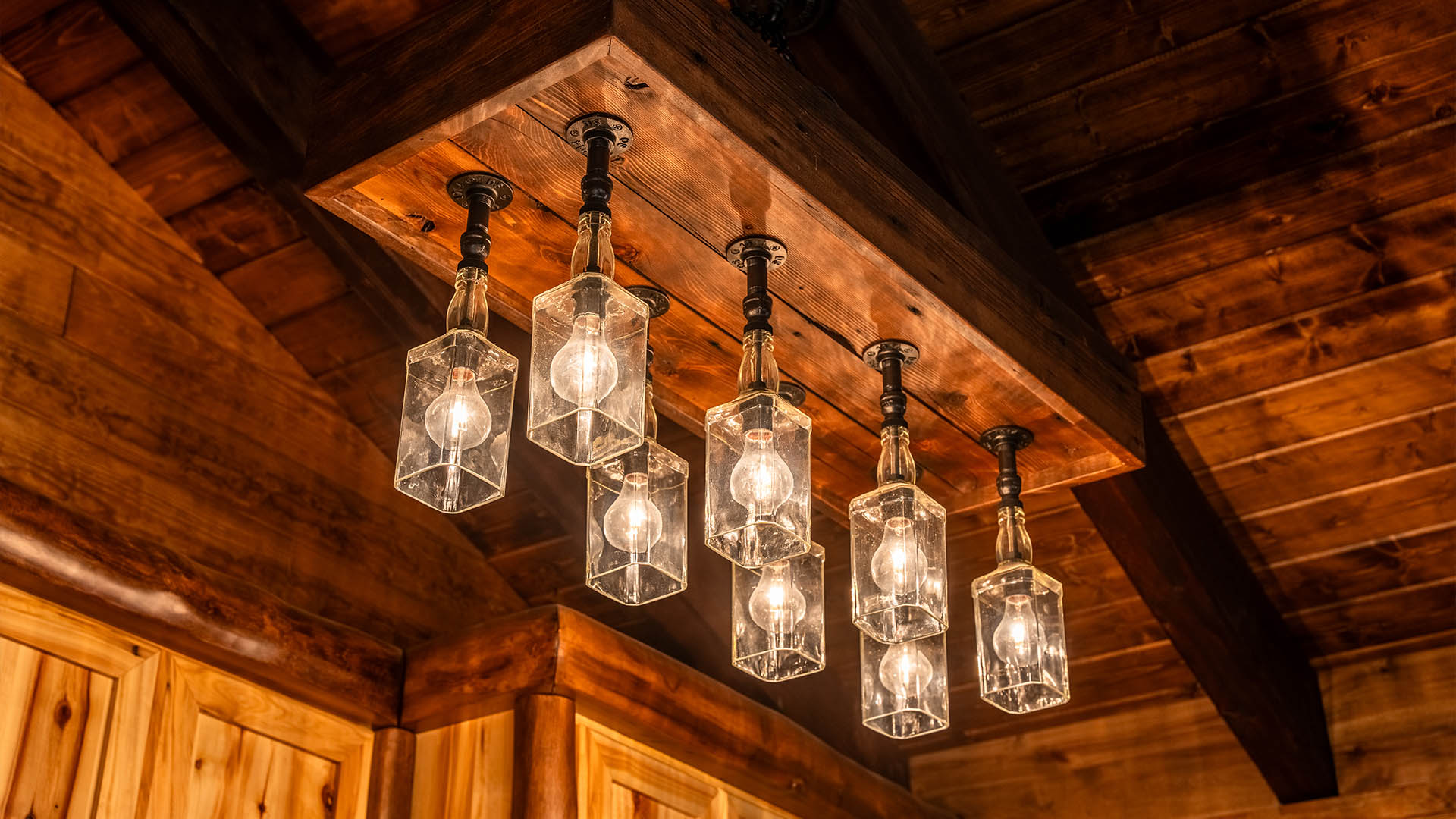 Whiskey bottle chandelier detail