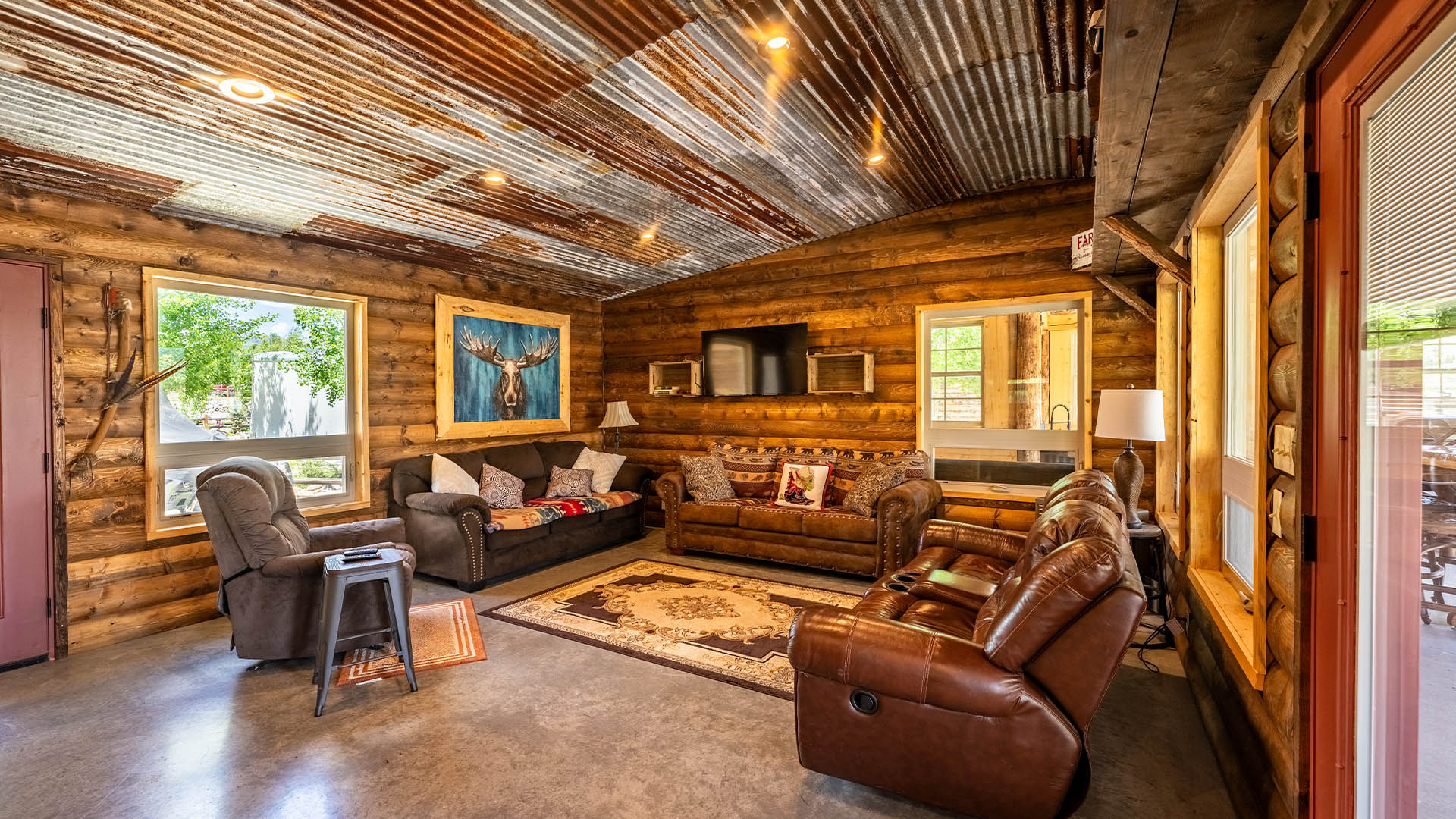 Clubhouse lounge with log walls