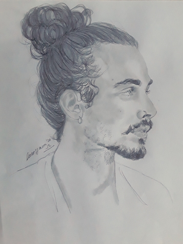 Potrait of a man with a long hair