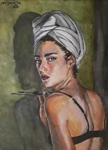 The girl puts on her make-up facing the viewer