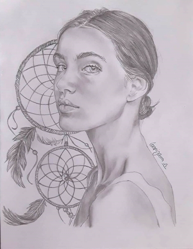 Potrait of woman wit dreamcathcher as background