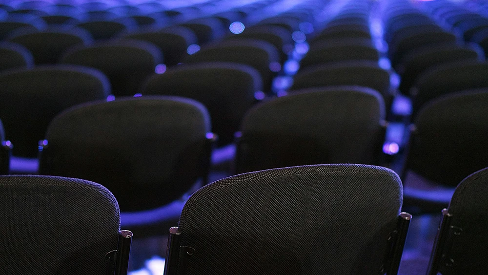 'Insulting and belittling': Legalweek attendees slam AI company's 'woman in red dress' booth