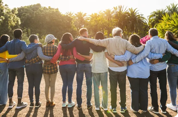 Line of people hugging