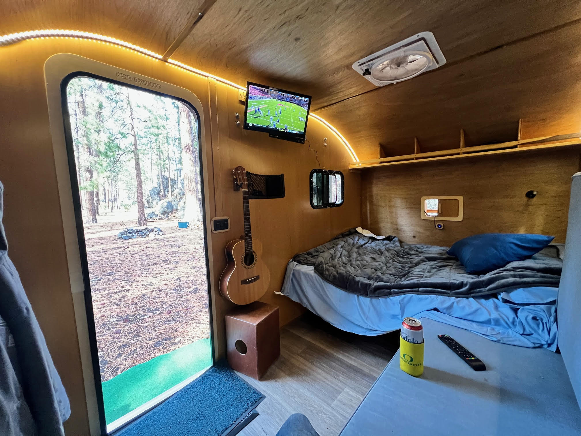 Off-grid 12V HD Smart TV w/ DVD Player and HD Antena. Side mounted with 12v ceiling plug (additional battery recommended). 