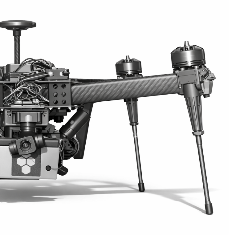 Close-up of a drone's carbon fiber arm with two motors and landing gear against a white background.