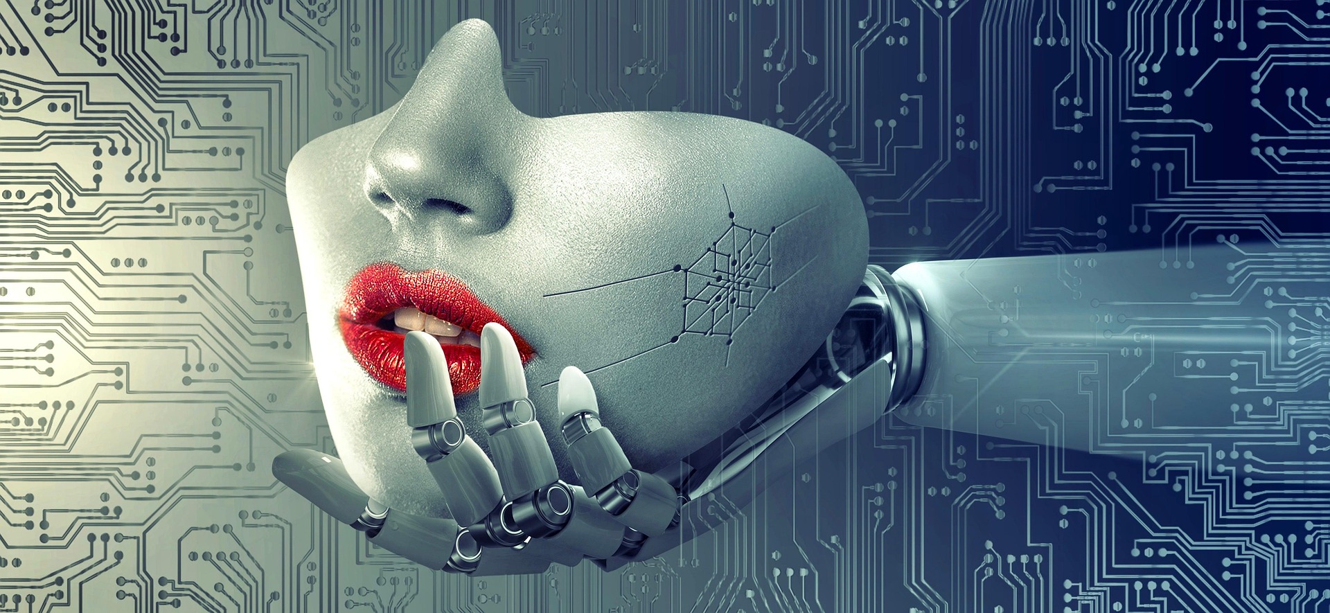 A robot hand holds a human face mask with circuit boards in the background.