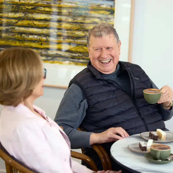 Couple enjoying outdoor dining at the Cafe at Mayflower Brighton
