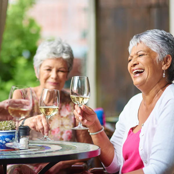Mayflower Brighton Residents enjoying a glass of wine.