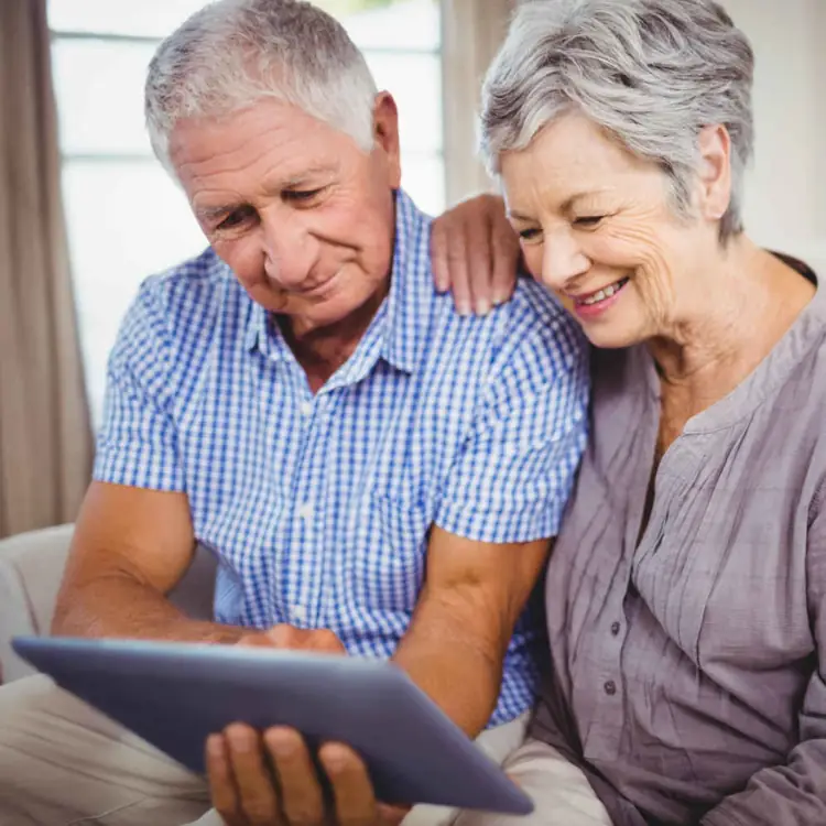 Older Couple With a tablet Device