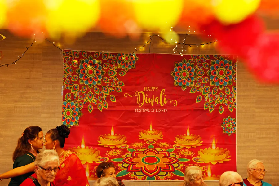 An overall photo of the Diwali decorations, including fairy lights, and a large banner saying "Diwali"