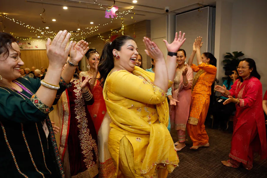 Staff of diverse backgrounds donned colourful saris and danced for residents