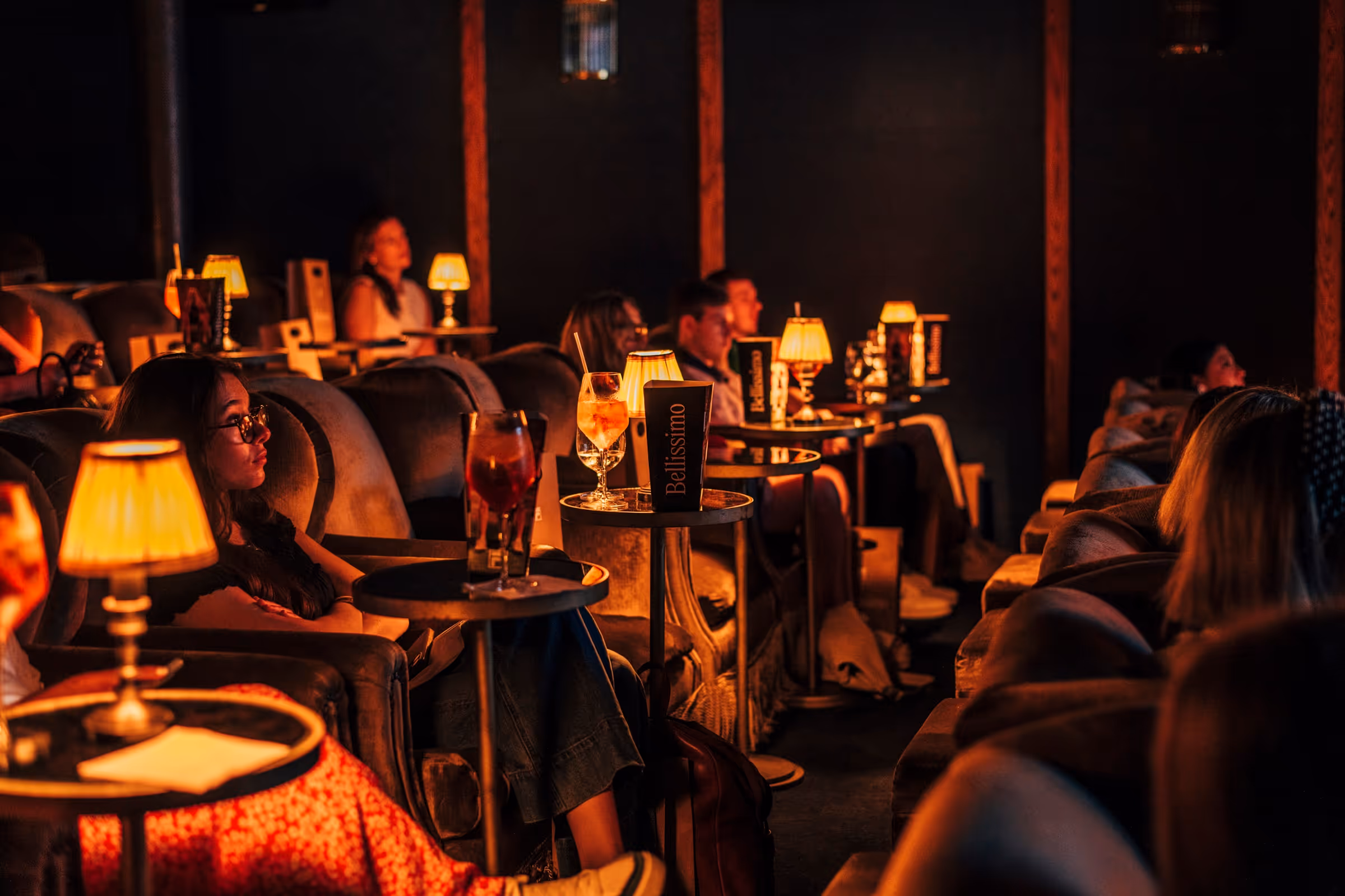 Movie theater chairs at the Fila Press Preview FW24 event.