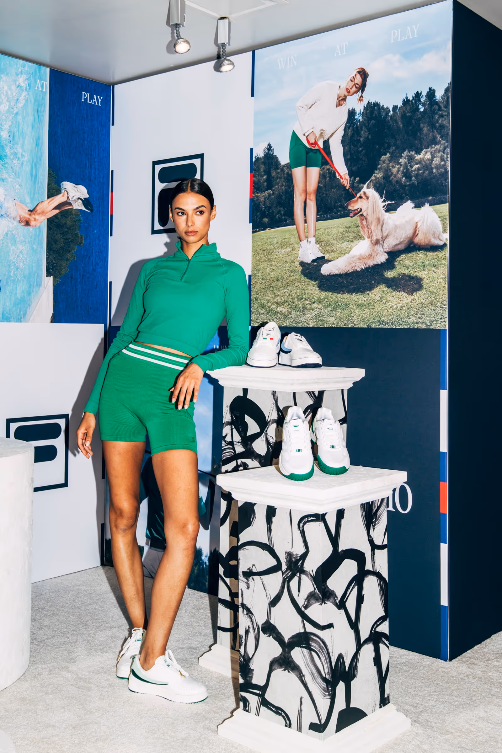 Woman posing at the Fila Press Preview FW24 event.