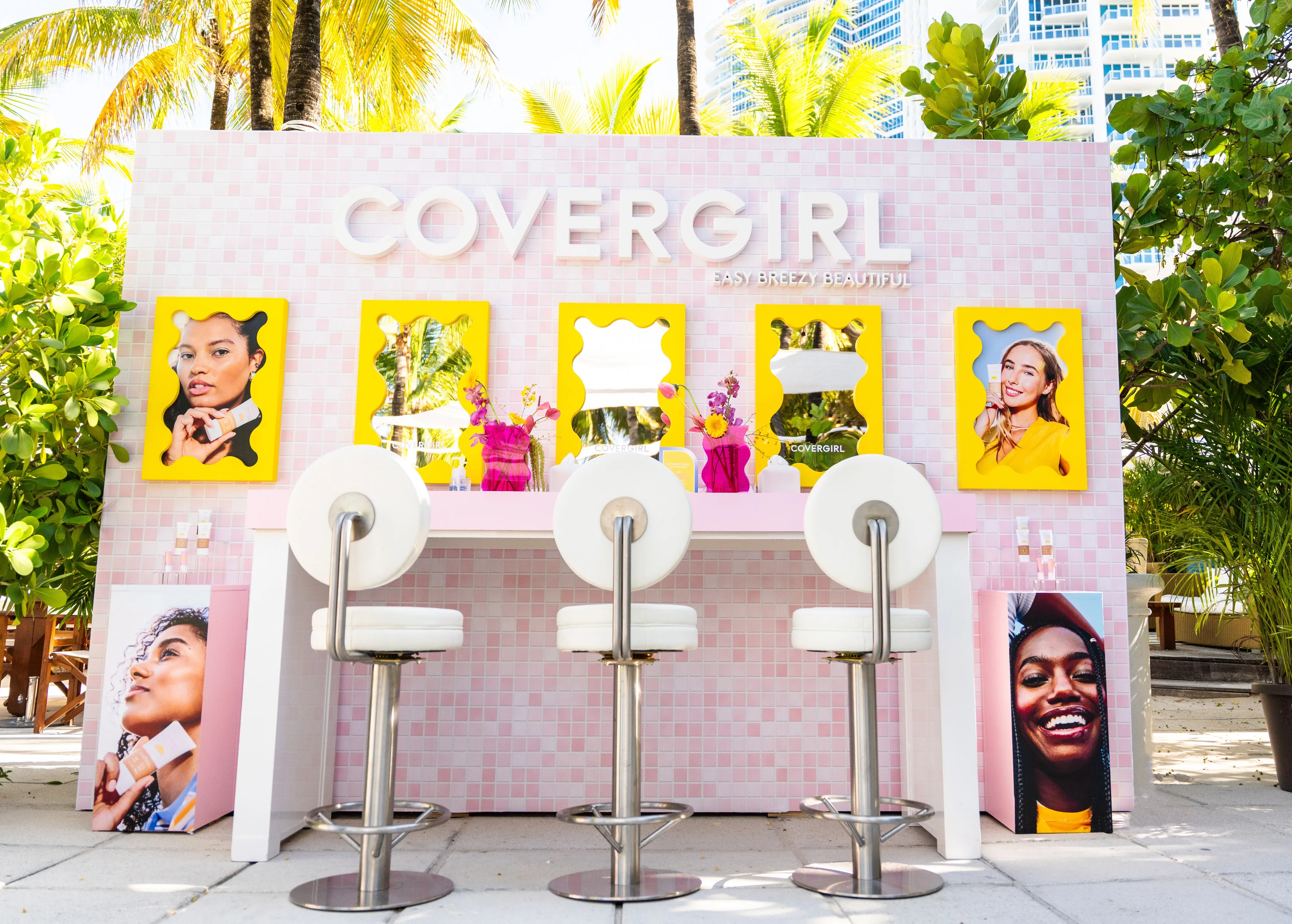Custom COVERGIRL makeup bar at Blur Beach Club where guests test products and create their own soft-focus looks.