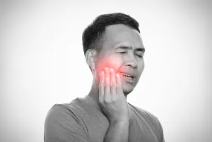 A person experiencing a toothache