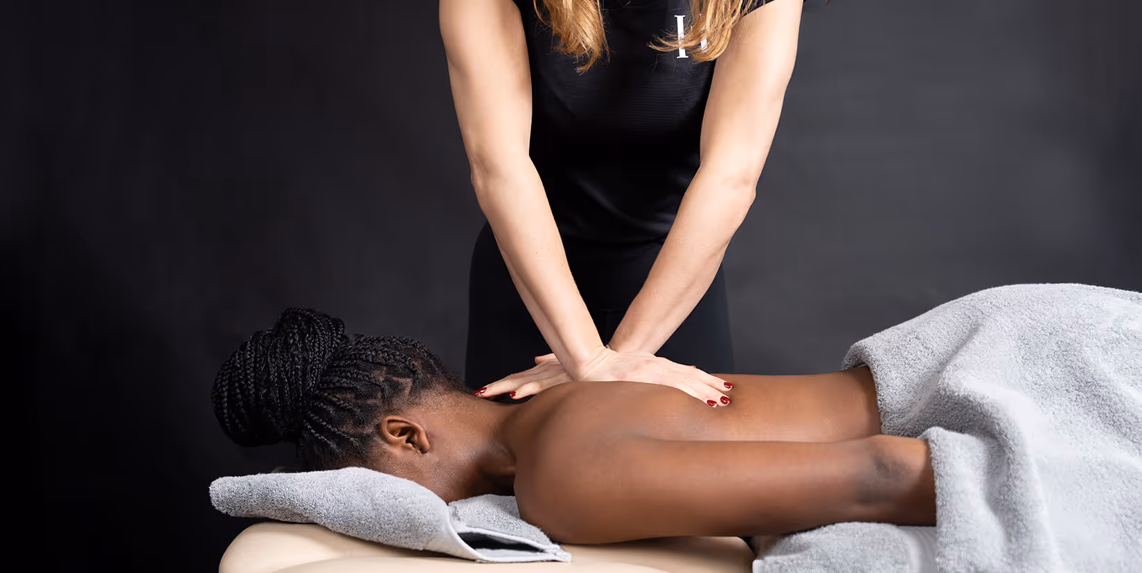 A person giving a sports massage
