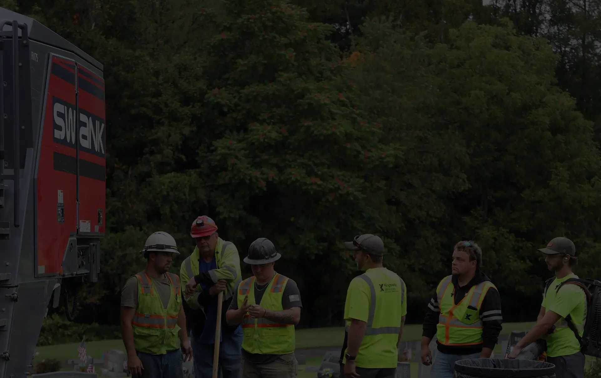 kingsway workers next to concrete pouring equipment