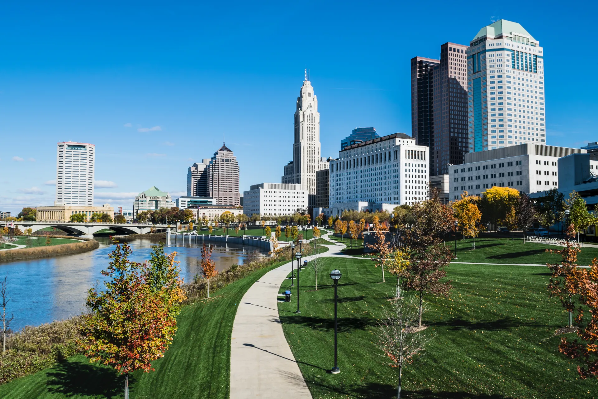 The skyline of Columbus, Ohio in the background, and the Scioto Mile path in the forefront.