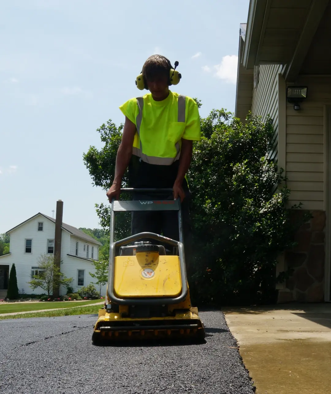 kingsway worker pushing equipment
