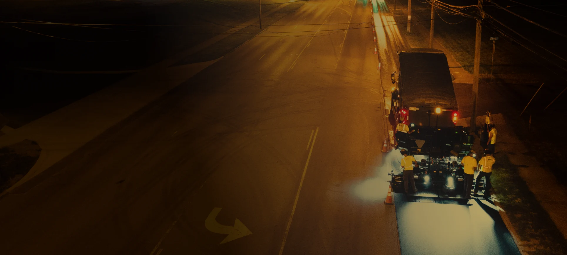 crew working on highway at night