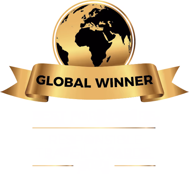 A gold-colored award badge with a globe icon and a banner that says "GLOBAL WINNER" in bold black letters.