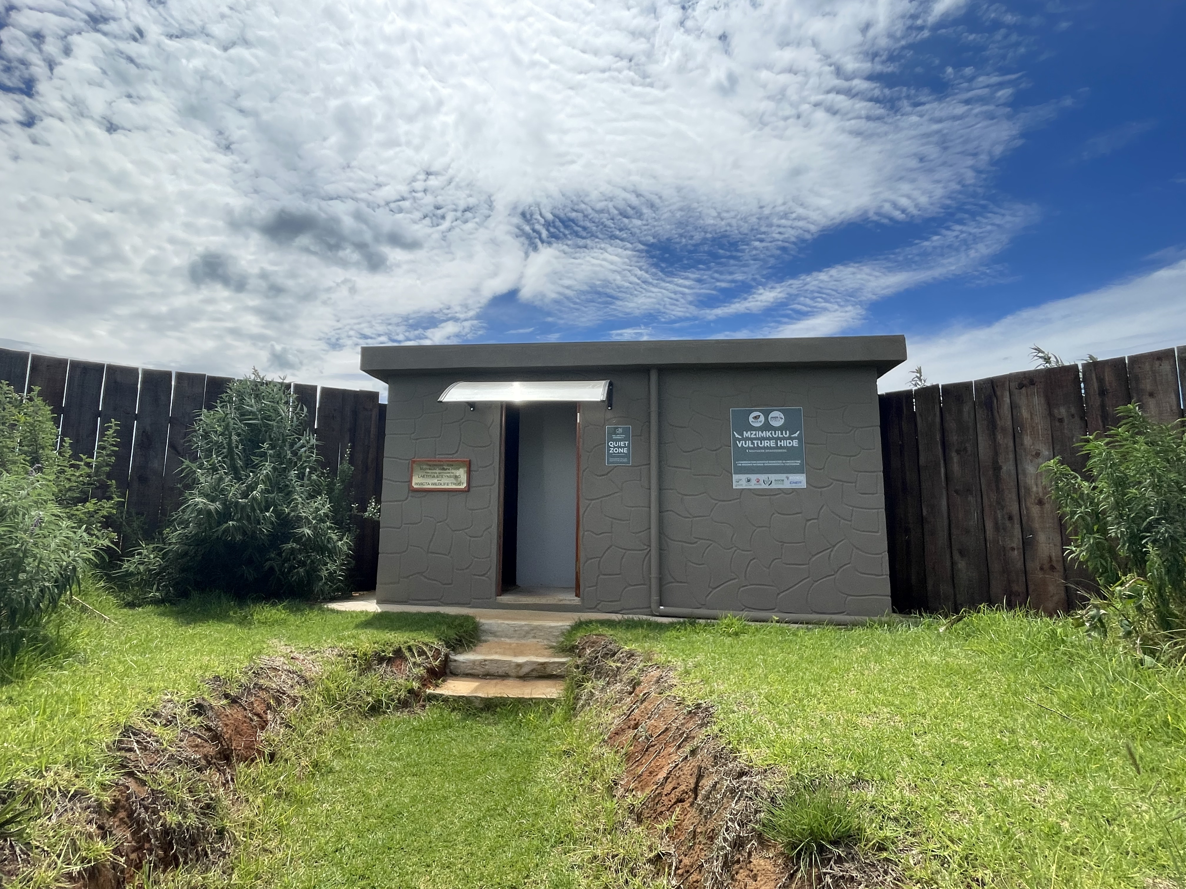 The exterior of the Mzimkulu Vulture Hide, a specialised structure used for monitoring Endangered vultures in a protected area.