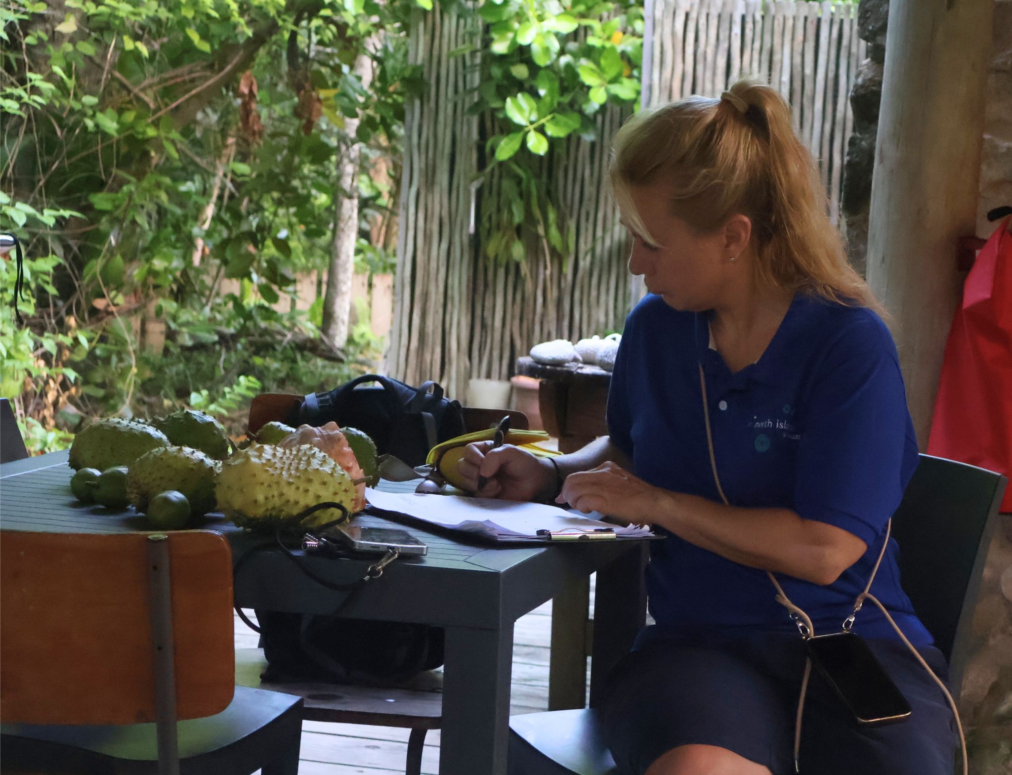 A volunteer records data as part of the debris audit