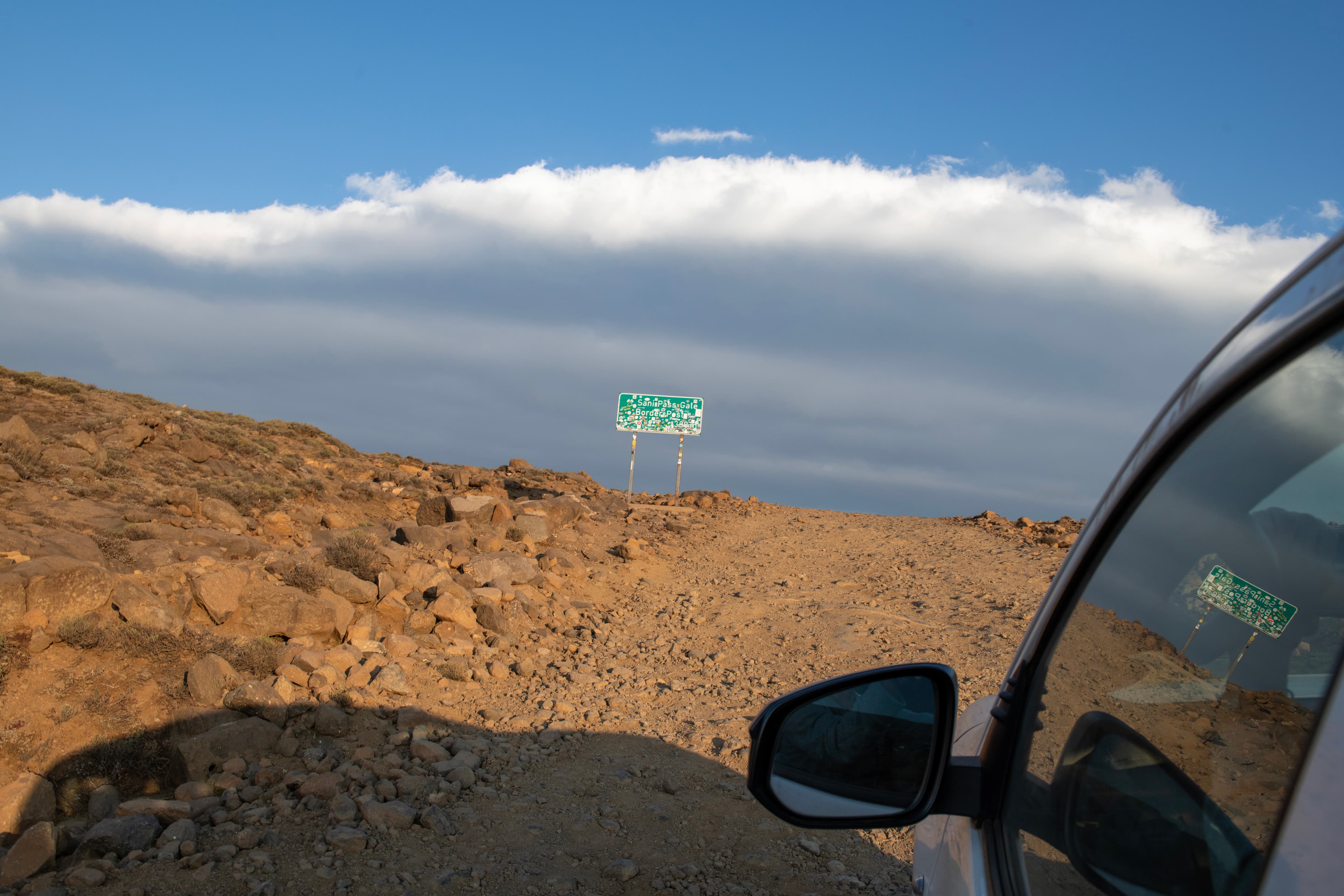 Driving up Sani Pass in the Drakensberg during a wildlife conservation fieldwork trip in South Africa