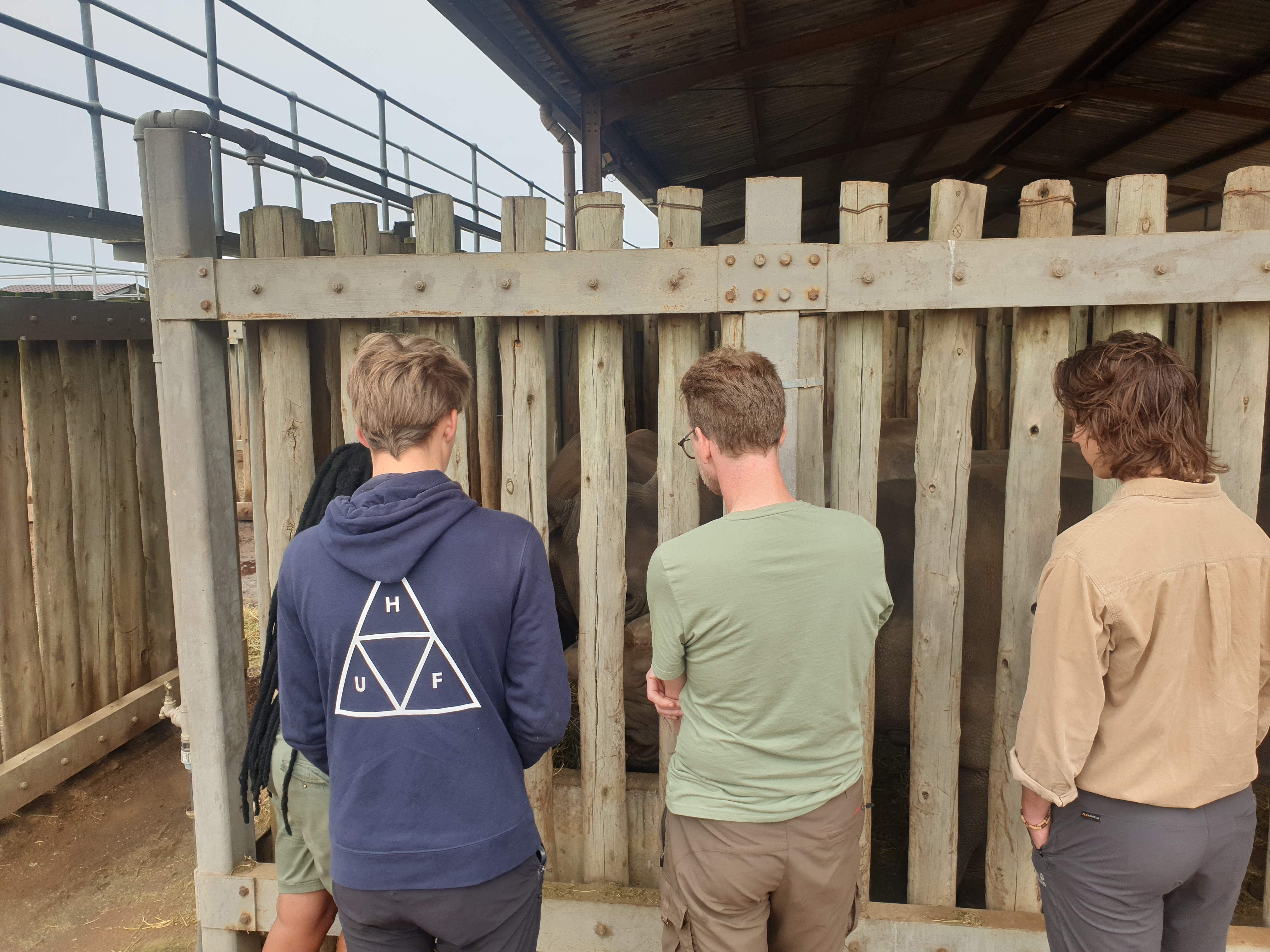 Course participants observing a game capture operation in the field
