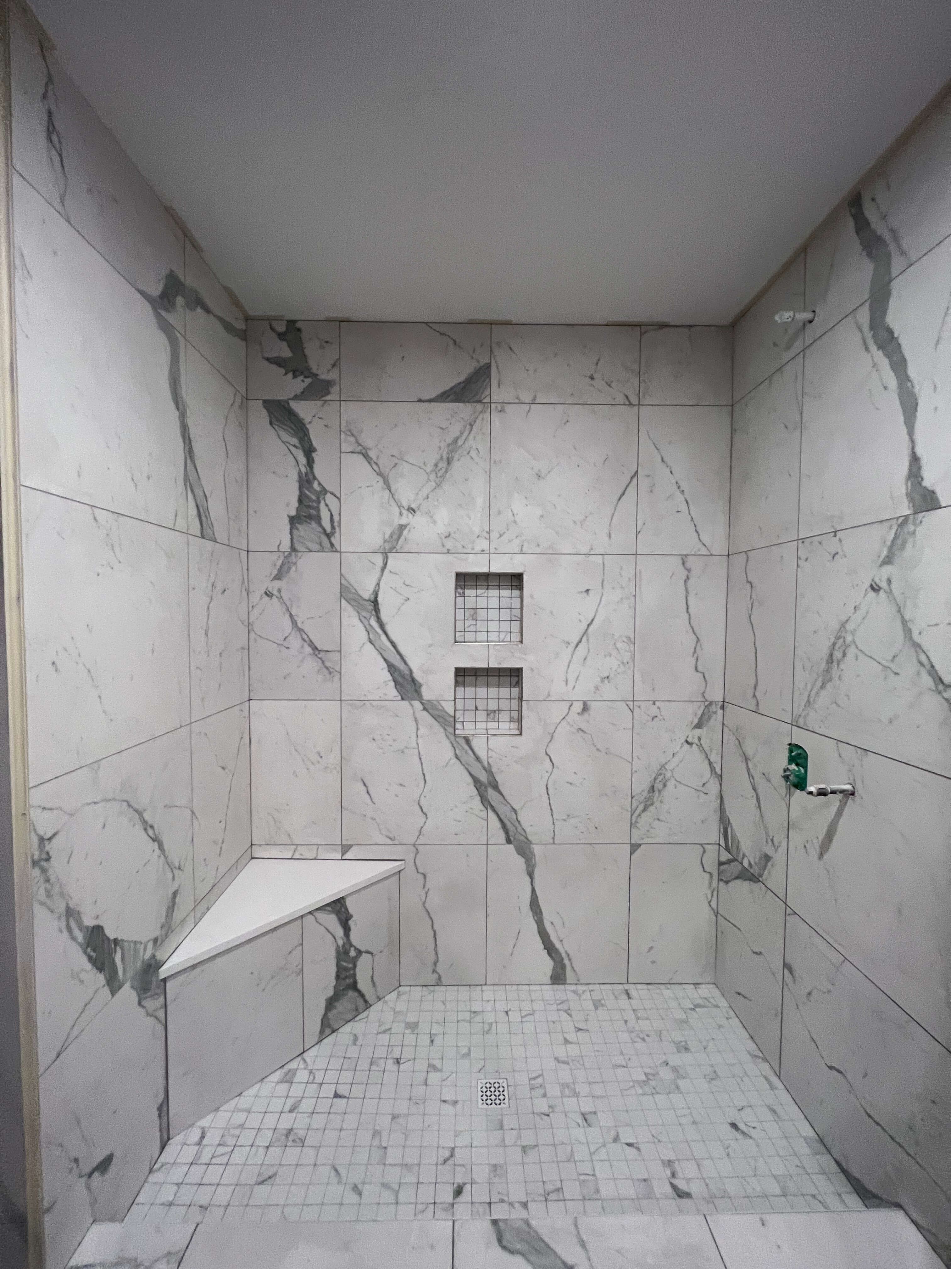 Marble patterned tiled bathroom 