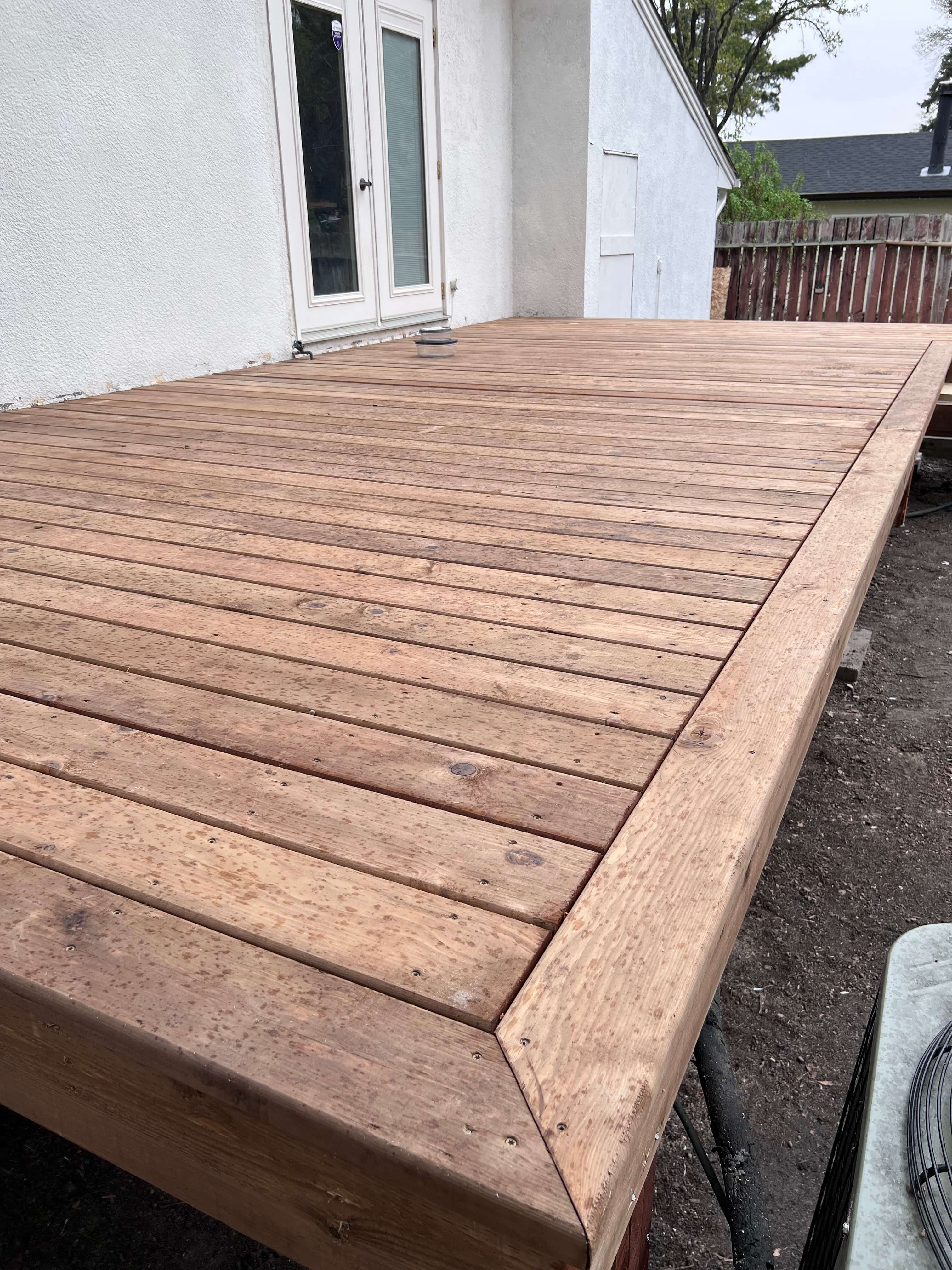 Finished deck attached to town house 