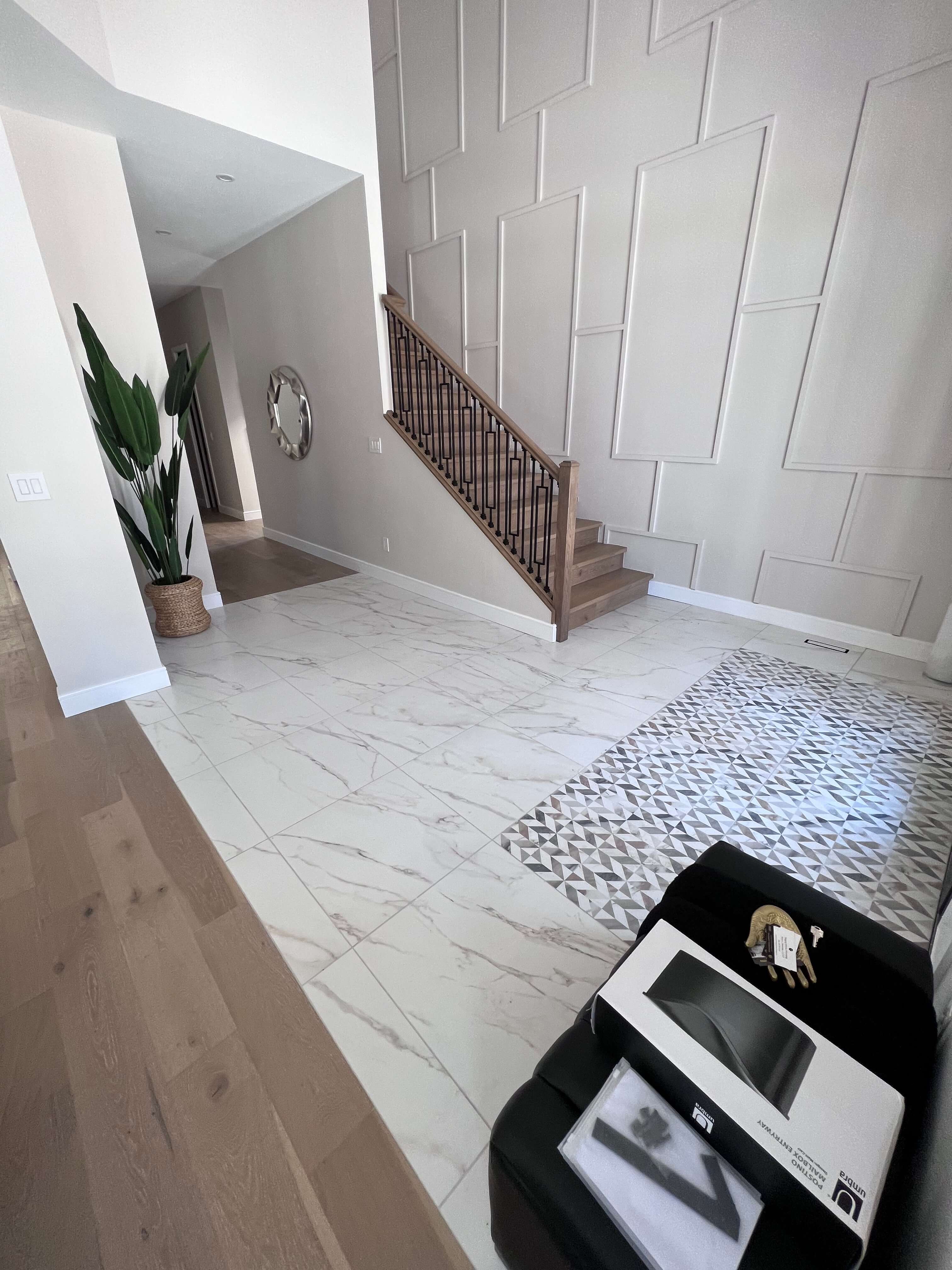 home entrance with new marbled tiles installed 