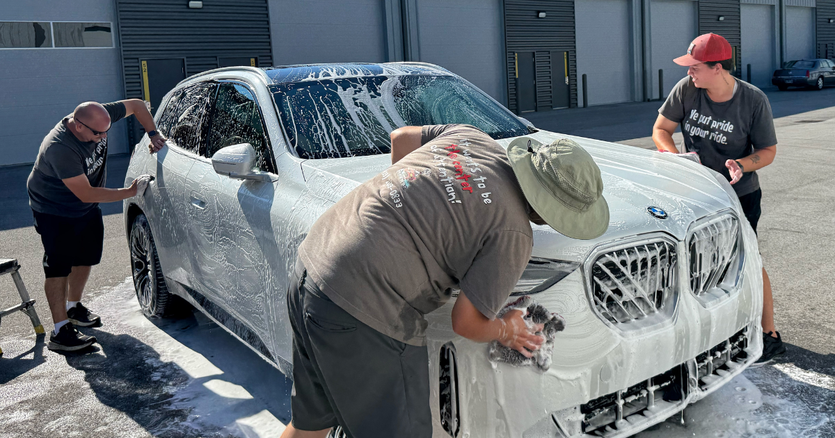 The Big Dog Detail team washing a car for a Cleveland, TN customer