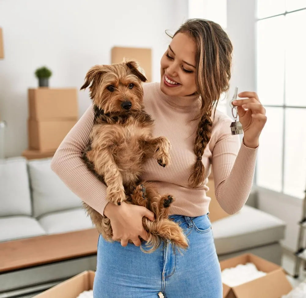 Woman holding Dog