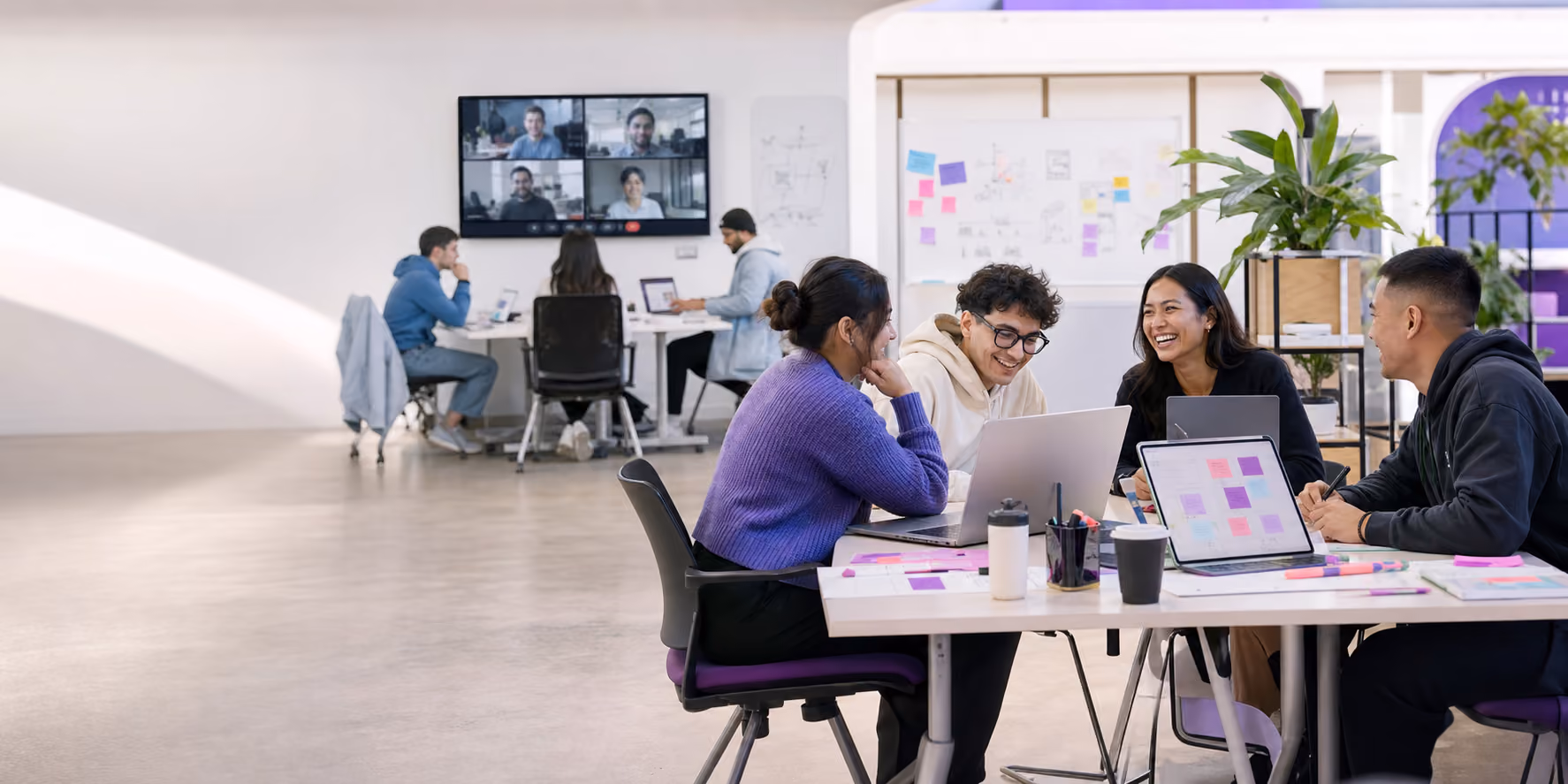 People collaborating at a Mission Ready AI hackathon