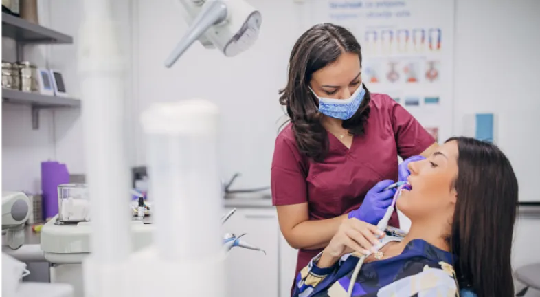 A woman getting a dental procedure done