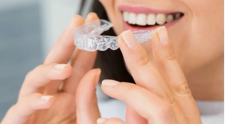 Clear upper Essix retainers.