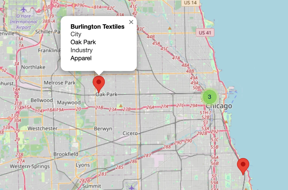 Selected marker popup reading Burlington Textiles, city Oak Park, industry Apparel