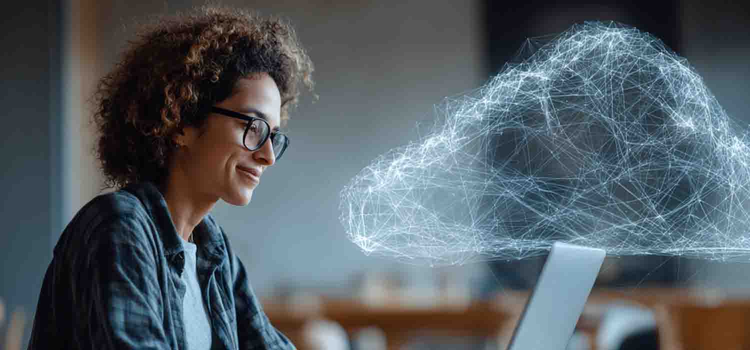 Business owner reviewing cloud based security issues on a laptop