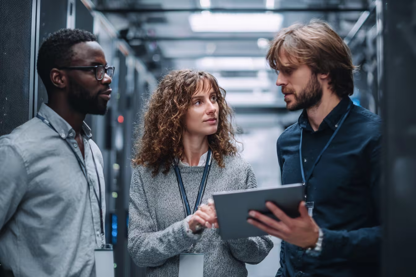 Team discussing unified threat management data