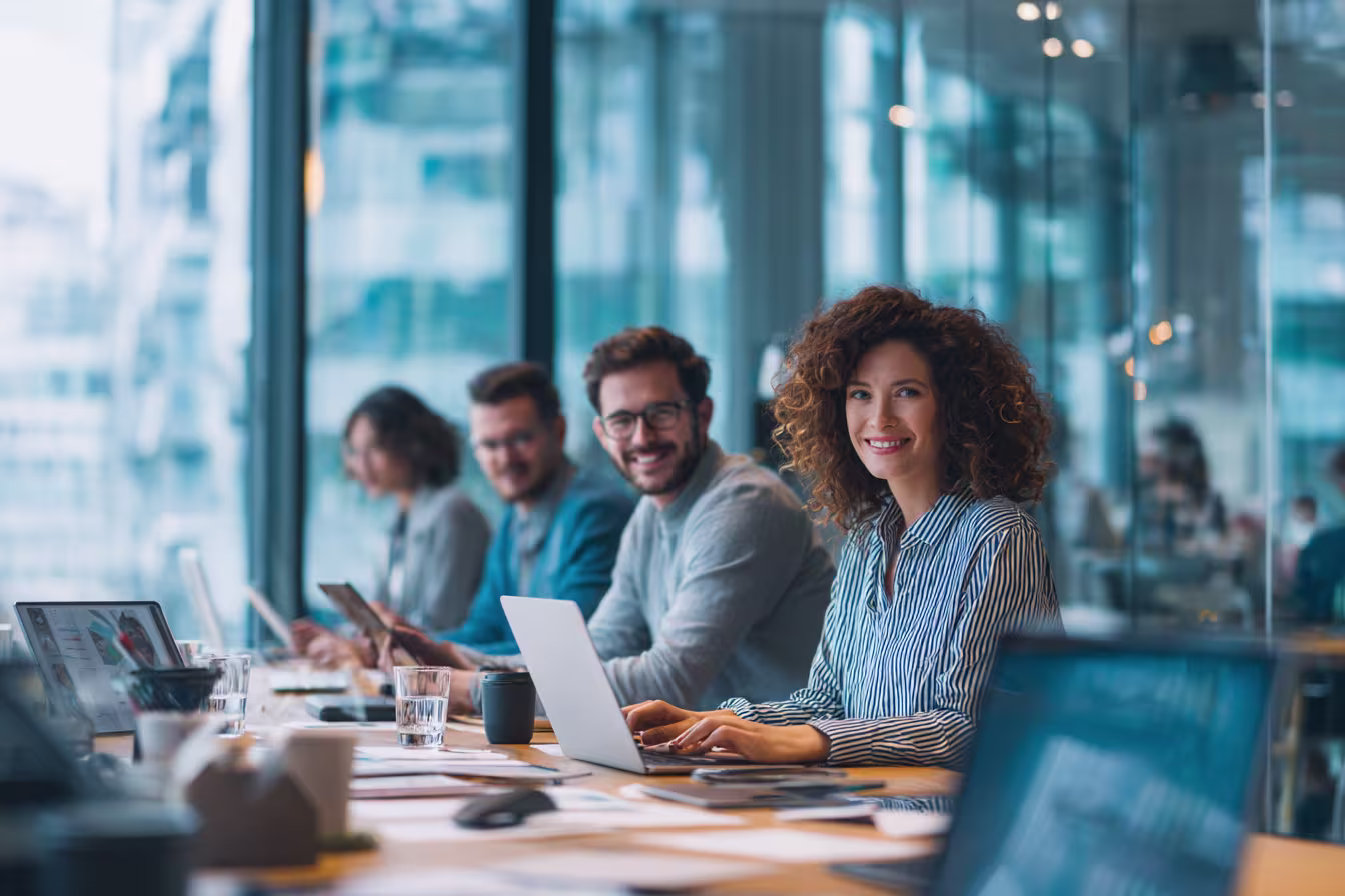 Diverse team collaborating during mid-morning