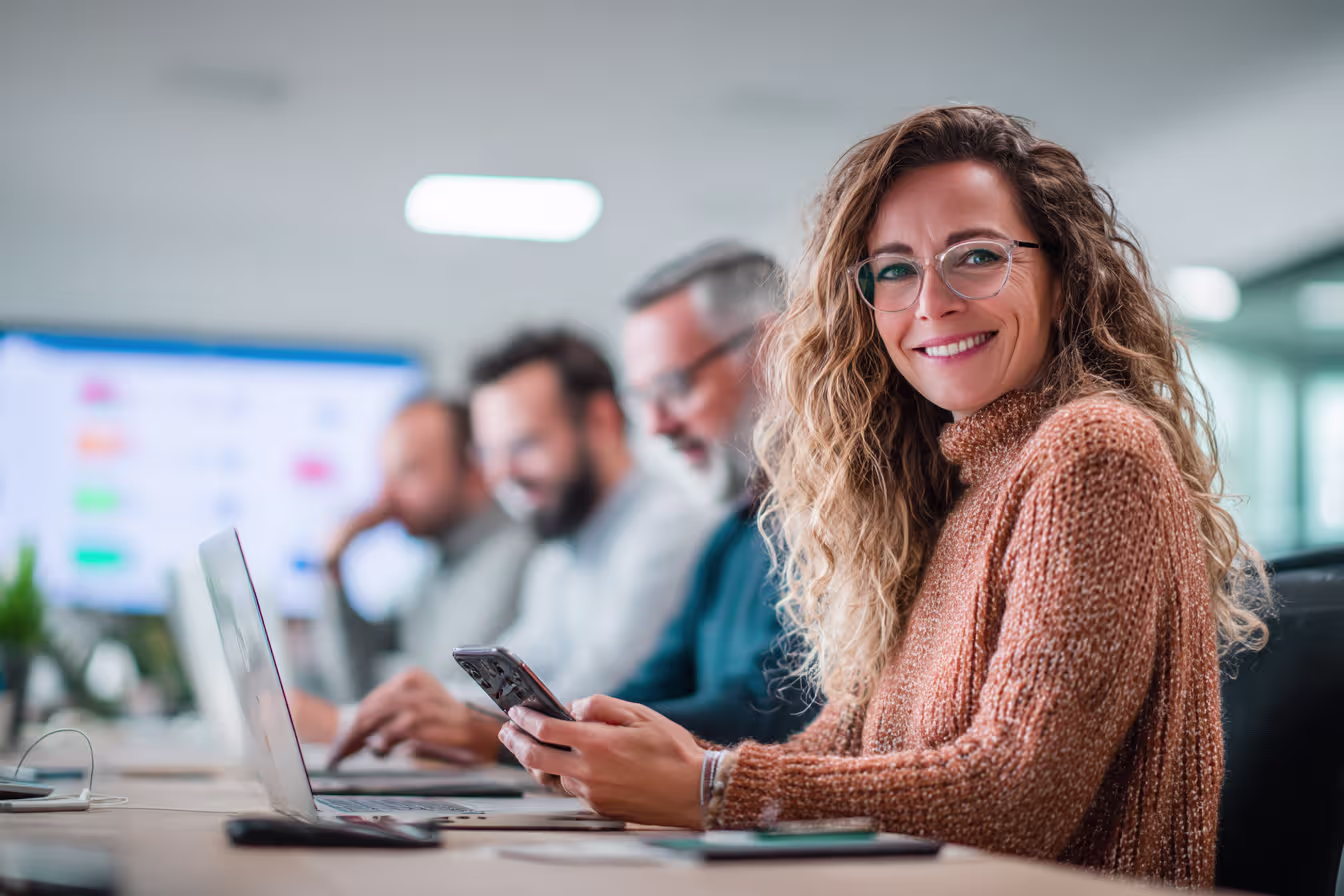 Diverse professionals using mobile workforce management