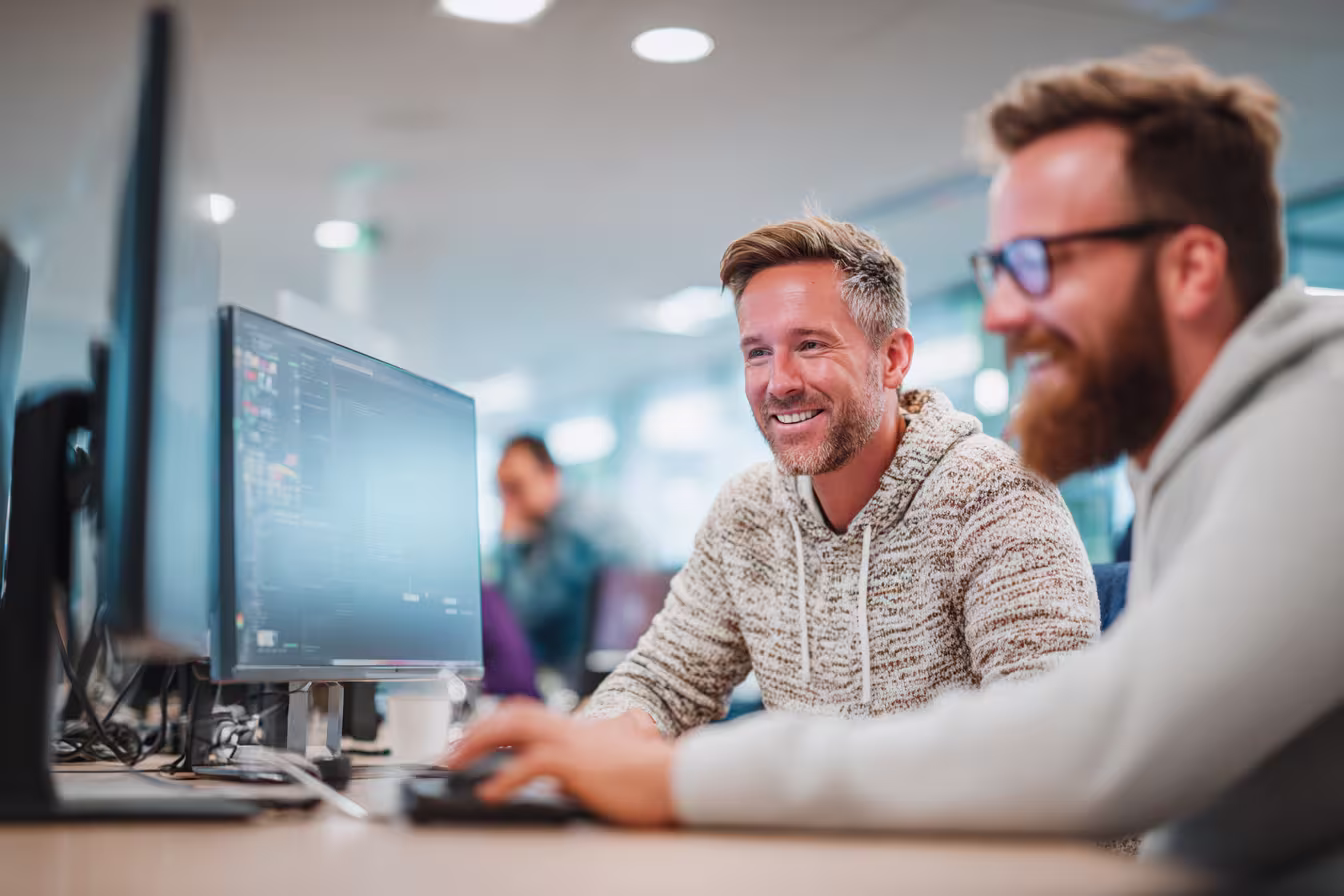 Professionals collaborating on hybrid cloud solutions