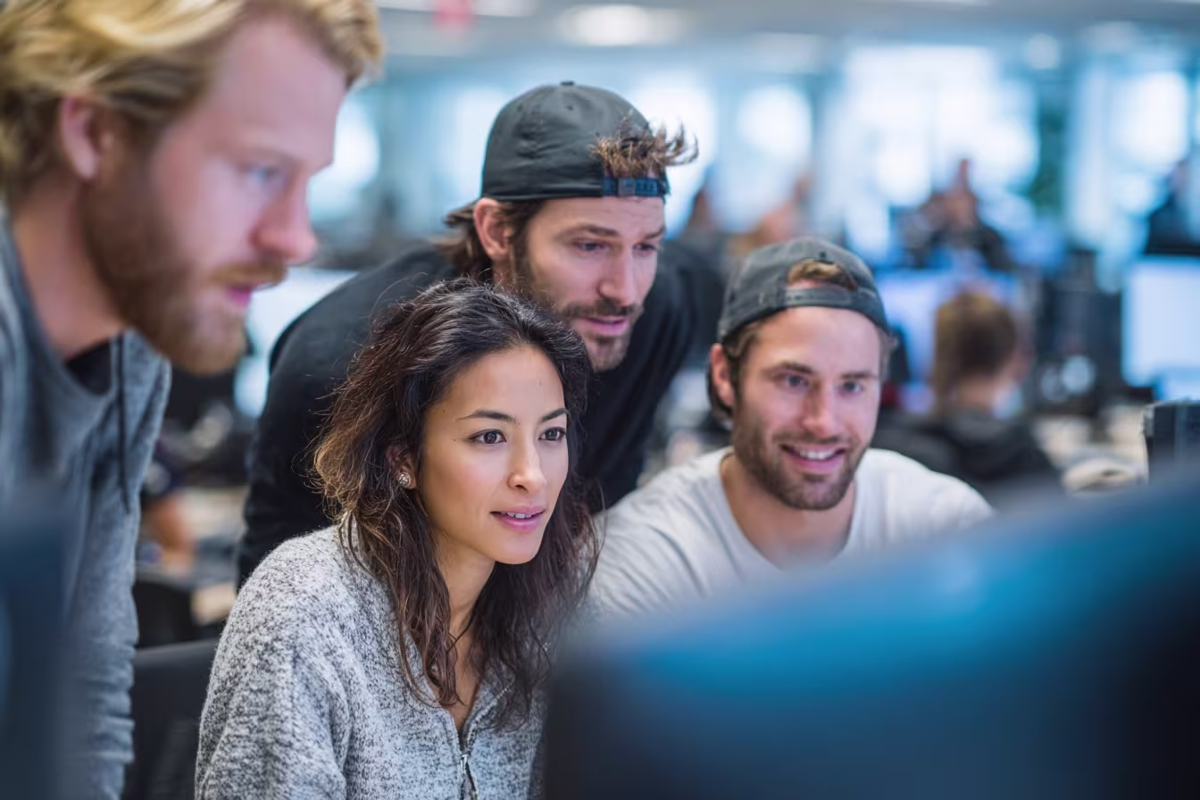 Diverse team discussing threat intelligence services