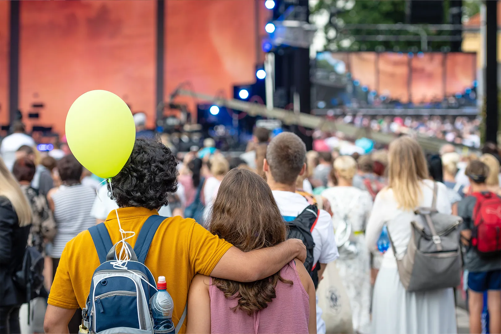 Crowd at a live outdoor event with stage and audience, illustrating the importance of crowd management and event asset management for safe and efficient event operations.