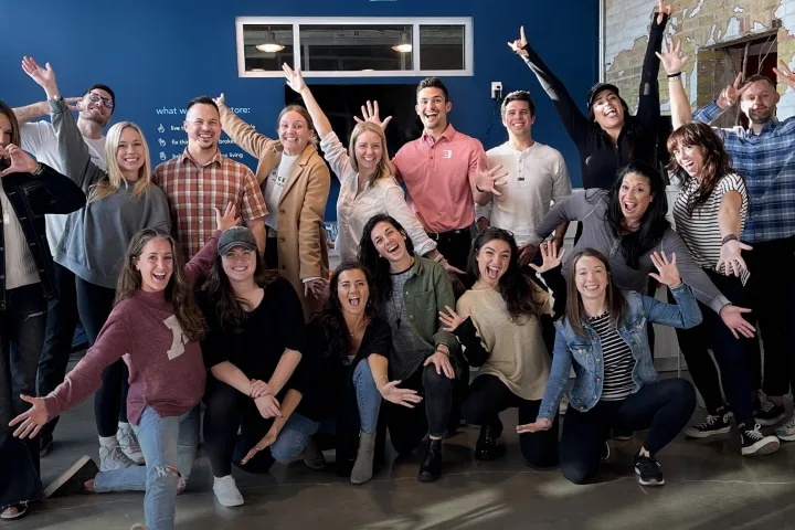 Restore employees posing at their Austin headquarters.