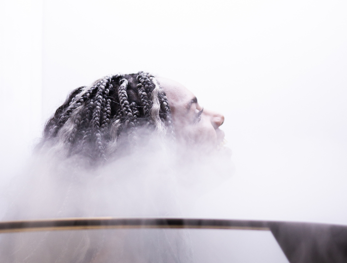 A person enjoys cryotherapy definition, the therapeutic use of cold for pain relief.